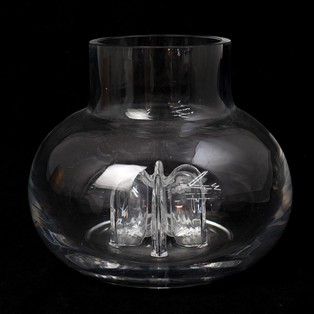 Orrefors Glass Vase: DESCRIPTION: An Orrefors clear glass vase. Features a clear glass bulb form foundation with inner six arm structure. Signed underneath "Orrefors" CIRCA: 20th Cent. ORIGIN: Sweden DIMENSIONS: H: 8.5" x