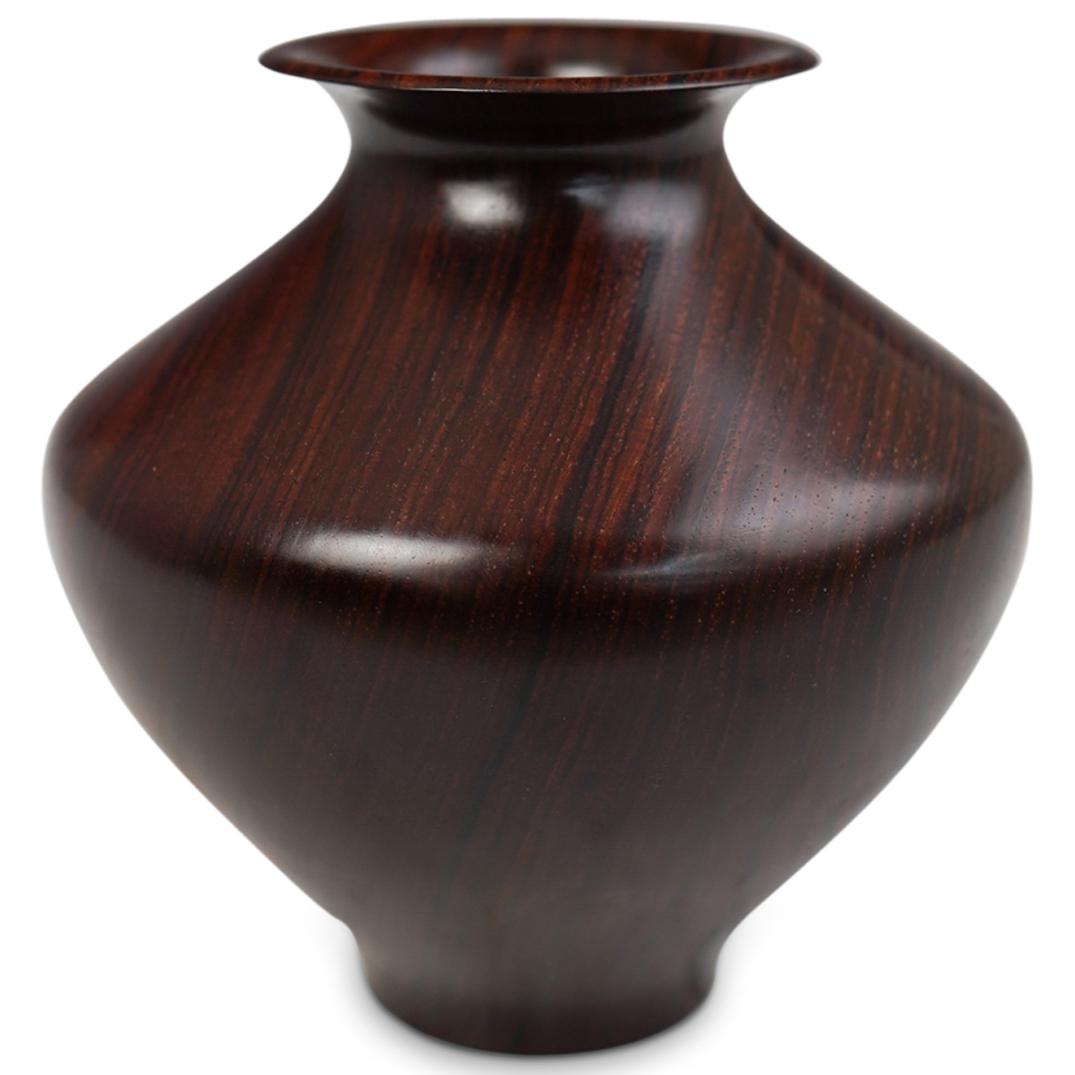 Willard Baxter (Georgia, 1933-2004) Wood Vase: DESCRIPTION: Willard Baxter wood carved vase. Features an overall wood foundation with hand carved vase form and flared rim. Signed at bottom "Baxter Wood, 69" CIRCA: 20th Cent. ORIGIN: USA DIMENSIONS