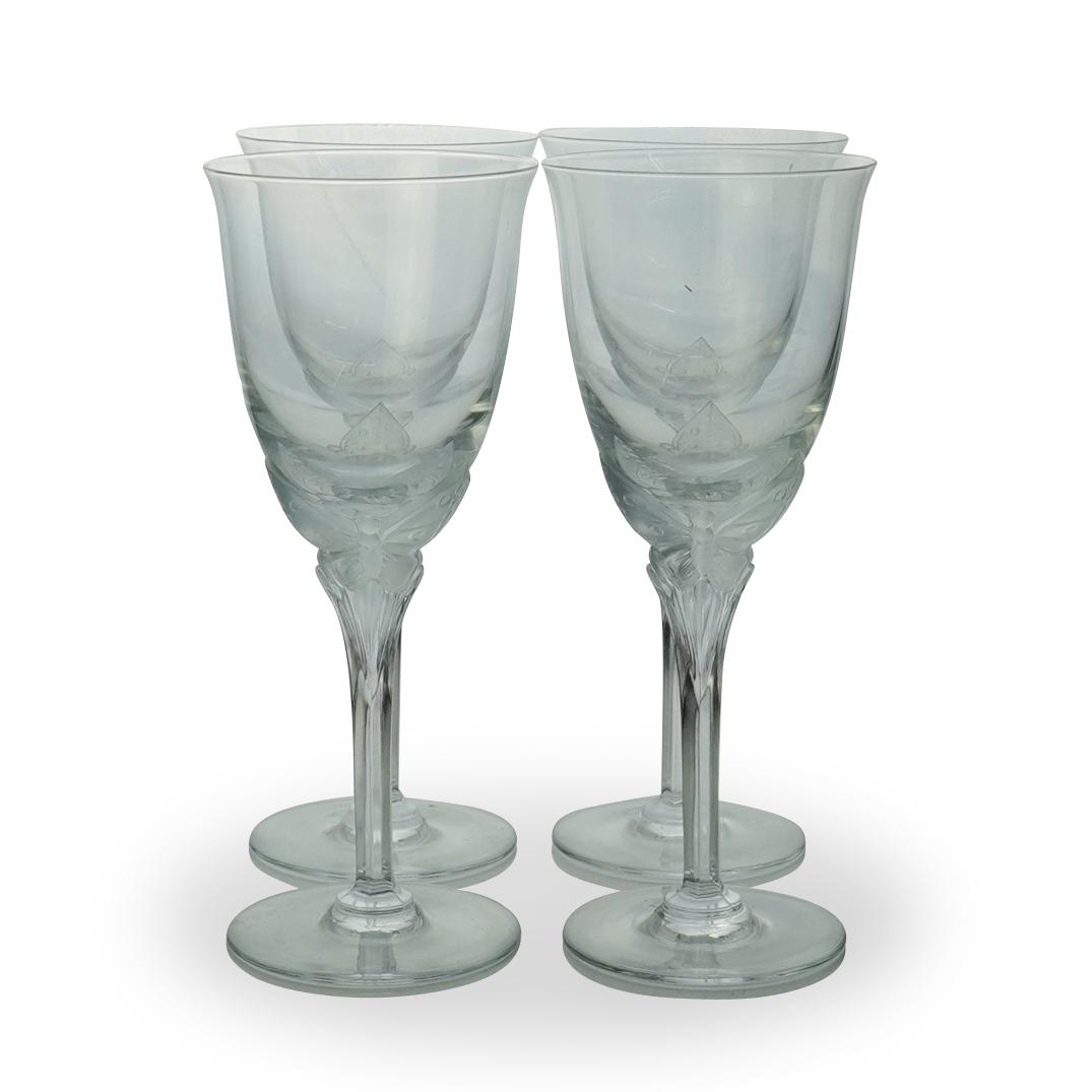 (4 Pc) Frosted Butterfly Wine Glasses: DESCRIPTION: (4 Pc) A set of four clear crystal butterfly motif wine glasses. Marked "HM, France" CIRCA: 20th Cent. ORIGIN: France DIMENSIONS: H: 7.5" x D: 3" CONDITION: Great condition. See lot descr