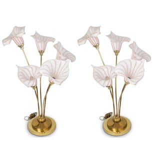 Majorie & Majorie Calla Lilies Lamps: DESCRIPTION: A pair of lamps by Majorie And Majorie featuring calla lilies hand blown glass murano shades in a light pink color sitting on brass stems and brass base. CIRCA: 1950s ORIGIN: Italian