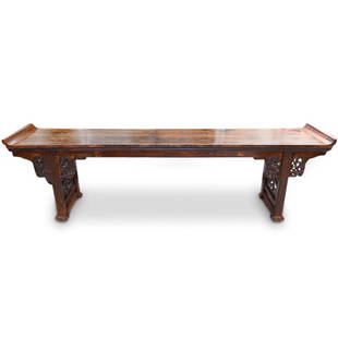 Large Antique Chinese Altar Table: DESCRIPTION: A large antique Chinese altar table composed of a hand carved wood dark brown patina finished in a floral motif. CIRCA: 19th Cent. ORIGIN: China DIMENSIONS: H:36" L:122" D:21" CONDITION: