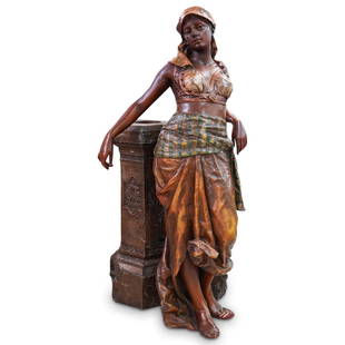 Large Orientalist Polychrome Statue: DESCRIPTION: Large lifesize mix metal orientalist Polychrome Statue. Features an traditionally dressed exotic Middle Eastern maiden leaning against a decorative wall with oriental accents. The wall