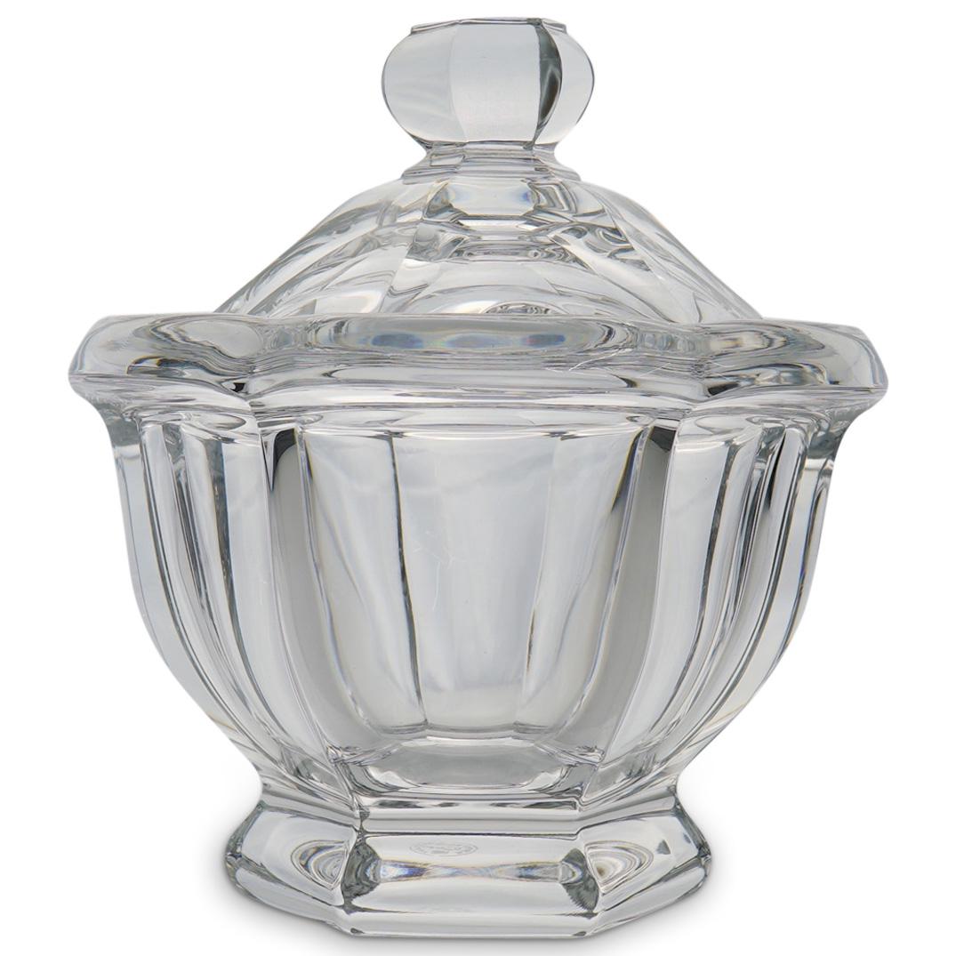 Baccarat Crystal "Missouri" Jam Jar: DESCRIPTION: Baccarat crystal "Missouri" jam jar adorned with curved contours along the body and a bell shaped lid topped with a round knob. Marked under the lid "Baccarat France" CIRCA: 20th Century 