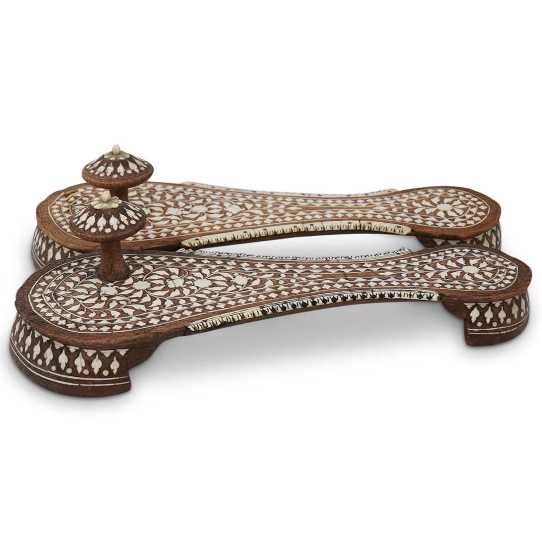 Indian Bone Inlaid Paduka Shoes: DESCRIPTION: a Pair of toe-knob shoes having bone inlay throughout decorated in geometric design of Islamic style with turned knobs. CIRCA: Mid 20th Cent. ORIGIN: India DIMENSIONS: L: 10.5" W: 4" COND