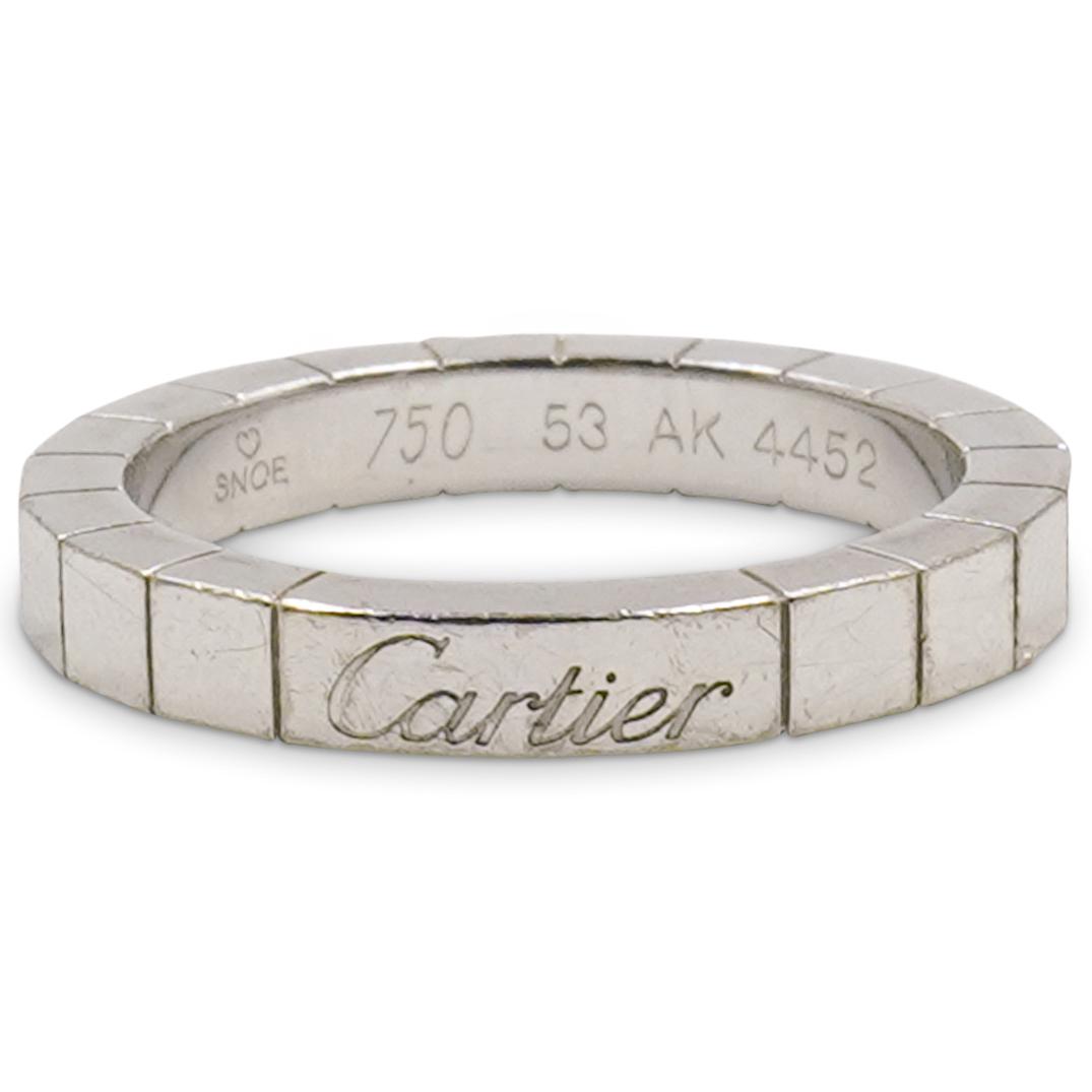Cartier Laniere 18k Gold Band Ring: DESCRIPTION: A Cartier 18k white gold band decorated in the "Laniere" pattern, marked "Cartier" and "750 53 AK 4452" along the inner band. Total Weight: 4.1 dwt CIRCA: 20th Cent. ORIGIN: France DIMENS