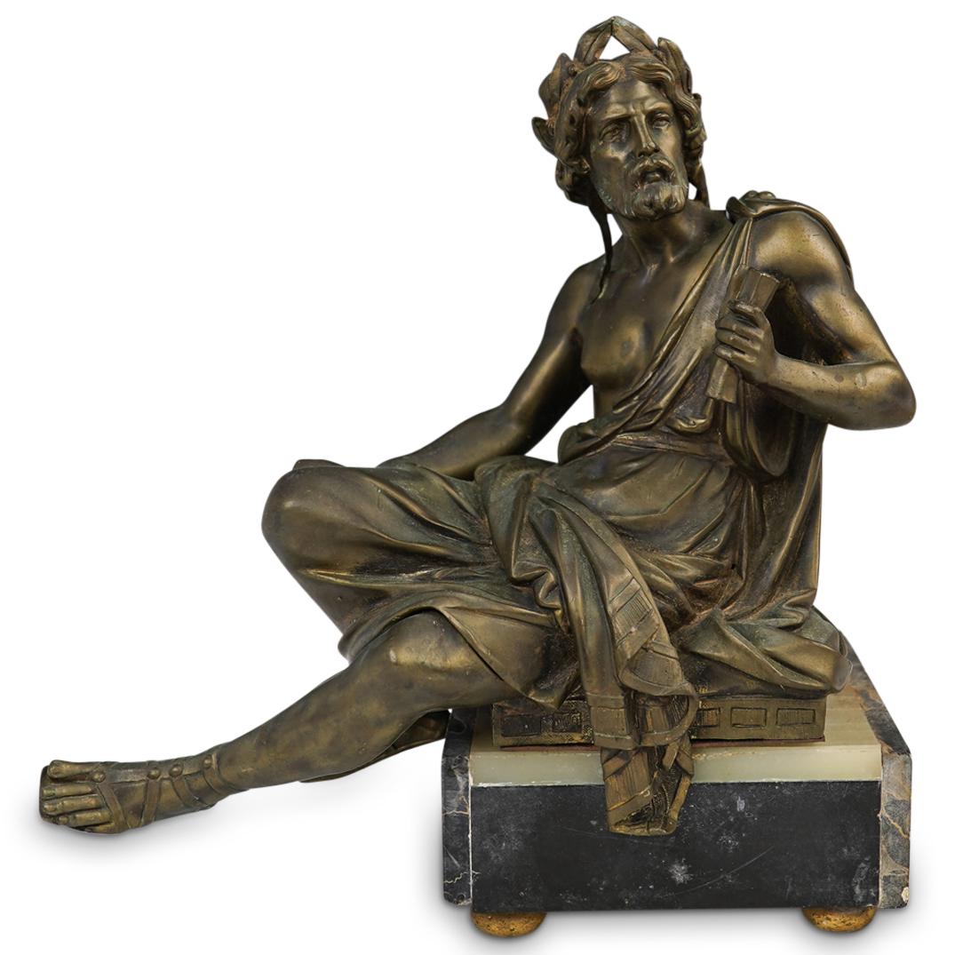 After Antoine Pierre Aubert "Greek Scholar" Bronze: DESCRIPTION: A Bronze after artist Antoine Pierre Aubert depicting a seated Greek scholar, the bronze is fitted atop a black Nero marble base, Sits atop four bun feet. CIRCA: Early-Mid 20th Cent. ORIG