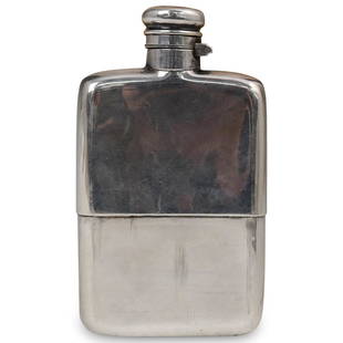 English Antique Sterling Silver Flask: DESCRIPTION: A British Antique sterling flask. Features a round edges square form. Finished with a twist cap and marked with a british L.G mark. CIRCA: 19th Century ORIGIN: Birmingham, England DIMENSI