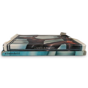 (2Pc) Designer Book Collection: DESCRIPTION: (2Pc) Designer book collection. Includes: (1) "Jungle Fever, Jean-Paul Goude" (1) "Helmut Newton, White Women" CIRCA: 20th Cent. DIMENSIONS: Range (H: 11.75" x L: 9.75") - CONDITION: Grea