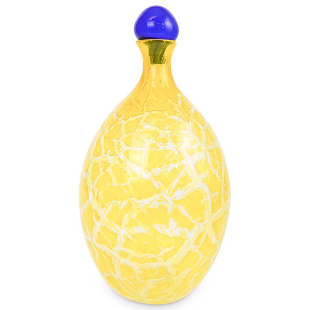 Barbini Crackle Glass Vase: DESCRIPTION: A Barbini Murano blown crackle glass vase with yellow color tones and a blue mushroom shaped stopper. Signed "Barbini, Murano" at base. CIRCA: 20th Cent. ORIGIN: Italy DIMENSIONS: H: 11.5