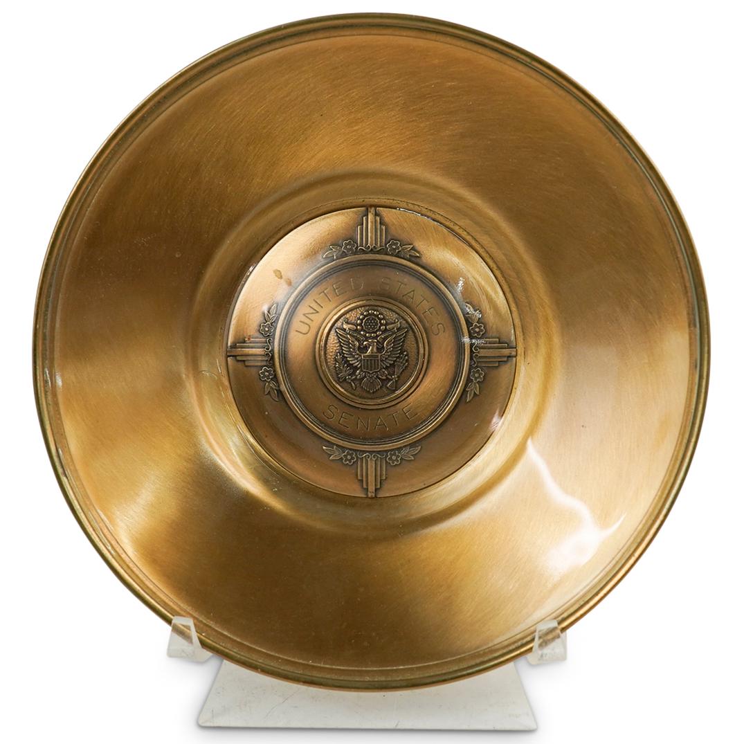United States Senate Ashtray: DESCRIPTION: A vintage United States Senate ashtray/dish composed of brass with glass overlay. Marked "United States Senate" CIRCA: 20th Cent. ORIGIN: USA DIMENSIONS: H: 1" x D: 6.5" CONDITION: Great 