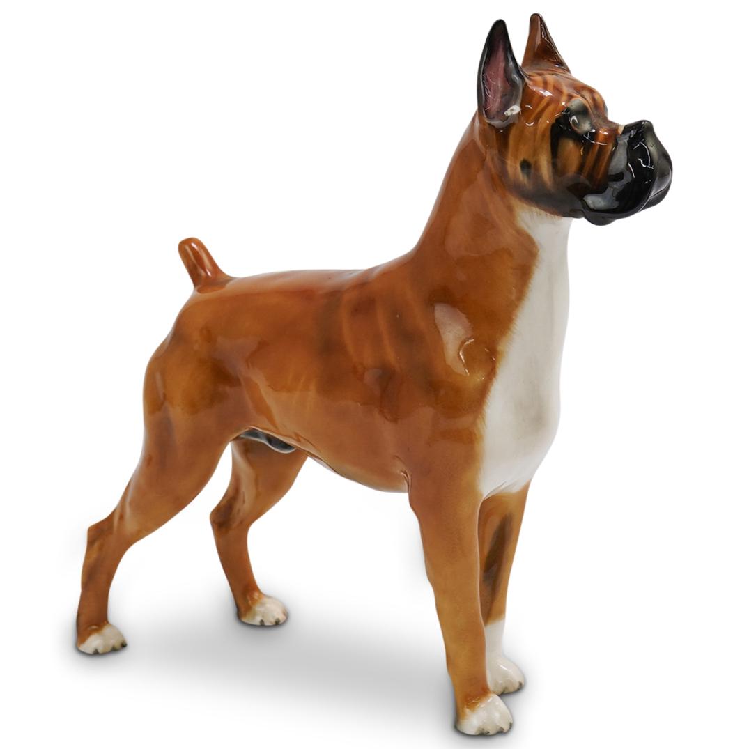 Royal Doulton Porcelain Boxer: DESCRIPTION: A royal Doulton porcelain boxer. Traditionally marked on the bottom Royal Doulton England and Warlord Of Mazelaine. CIRCA: Mid 20th ct ORIGIN: England DIMENSIONS: H:6.5" L:6.5" W:2" CONDI