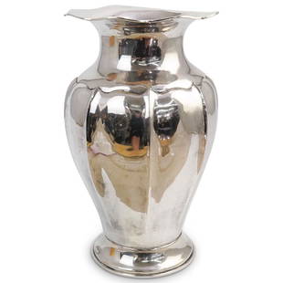 Large European 800 Silver Vase: DESCRIPTION: A large hand hammered 800 silver vase completed with a ruffled rim, stamped along the underside "800". Total Weight: 1,300 grams CIRCA: 20th Cent. ORIGIN: Possibly Italy DIMENSIONS: H: