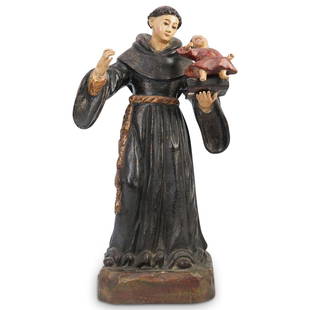 19th Cent. Gesso St. Francis Sculpture: DESCRIPTION: St. Francis Fully carved with gesso, with reverse painted glass eyes, depicted as a monk holding baby Jesus in his left arm; painted in polychrome. CIRCA: 19th Cent. ORIGIN: Continental D