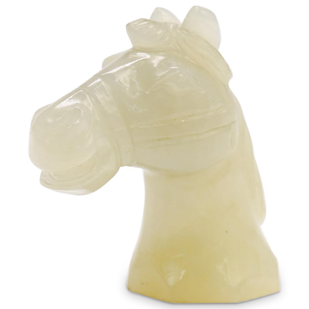 Antique Chinese Carved Jade Head Horse: DESCRIPTION: Antique Chinese Carved Jade Horse Head - Han dynasty style.CIRCA: Early 20th CenturyORIGIN: ChinaDIMENSIONS: H: 2 1/4" W: 1 1/2" weight: 48 grs.CONDITION: Great condition. See lot descrip