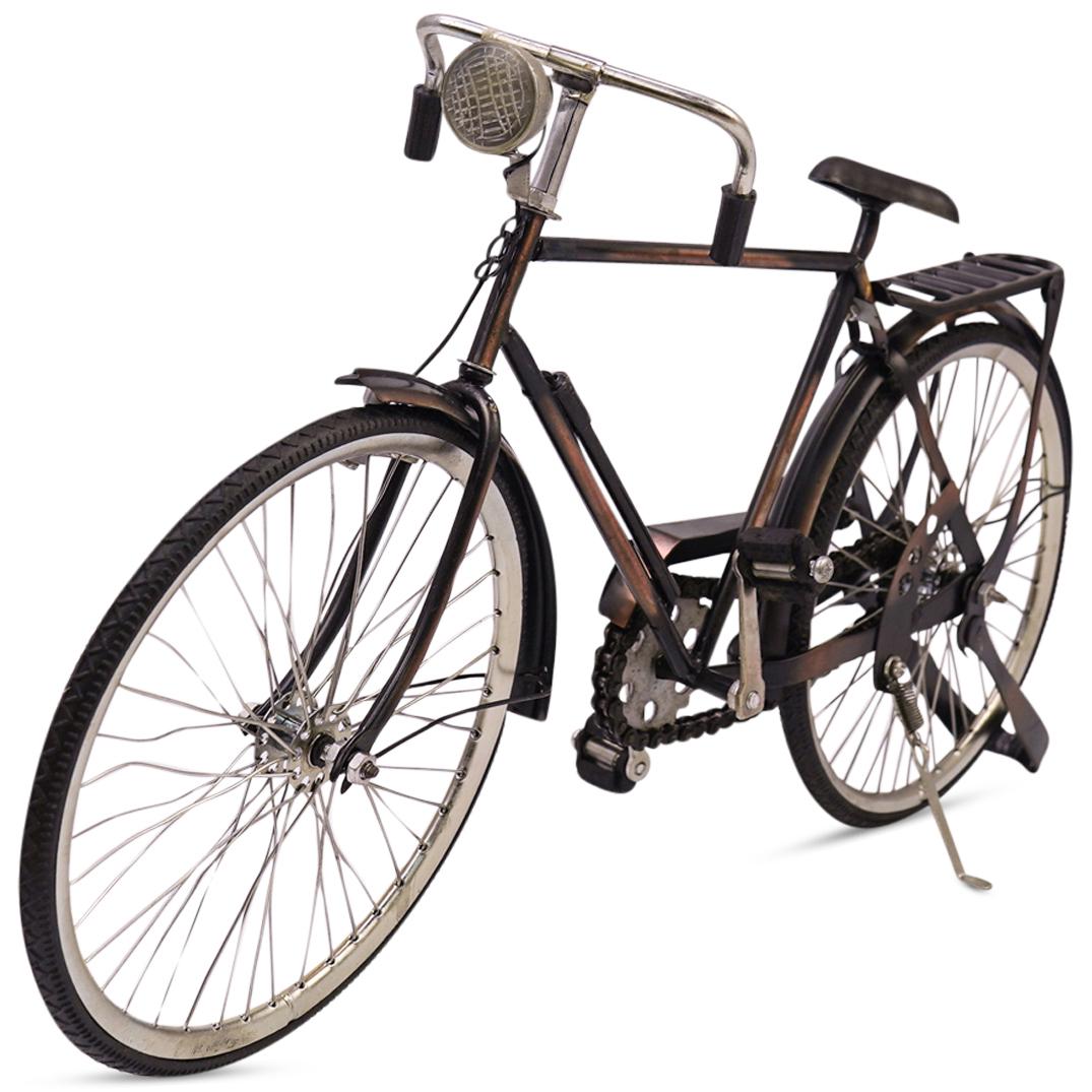 Mid-Century Collectible Retro Bike Scale Model: DESCRIPTION: Collectible Handmade Metal Scale model of a retro city bicycle figurine in rust copper color with moving parts such as operating wheels and chain. CIRCA: Mid 20th CenturyORIGIN: USADIMENS