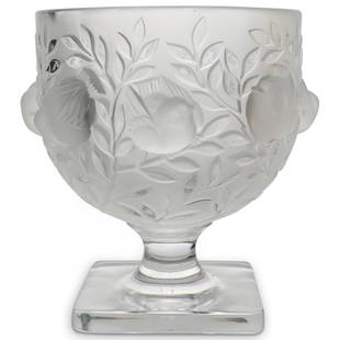 Lalique Crystal "Elizabeth" Vase: DESCRIPTION: A Lalique crystal "Elizabeth" vase. Features embossed birds, nestles along stems of branches enveloping the birds. Rests on a stem and squared base. Signed:"Lalique France". CIRCA: 20th