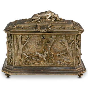 "A.B. Paris" Silver Bronze Casket Box: DESCRIPTION: A French "A.B. Paris" figural relief casket box. Features a copper foundation with silver and gold varnish exterior. Decorated with forest hunting scenes, intricate flowering vines and