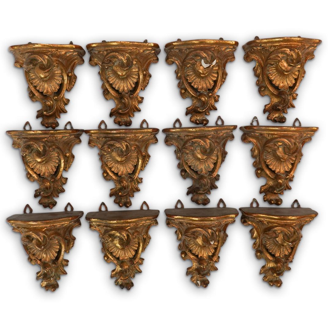 (14Pc) Antique Rococo Gilt Bracket Collection: DESCRIPTION: (14Pc) A collection of (14) Rococo gilt plaster carved wall brackets. Mounted with wall hanging hooks at reverse. CIRCA: 20th Cent. ORIGIN: France DIMENSIONS: H: 5" x W: 4" x Depth: 3" CO