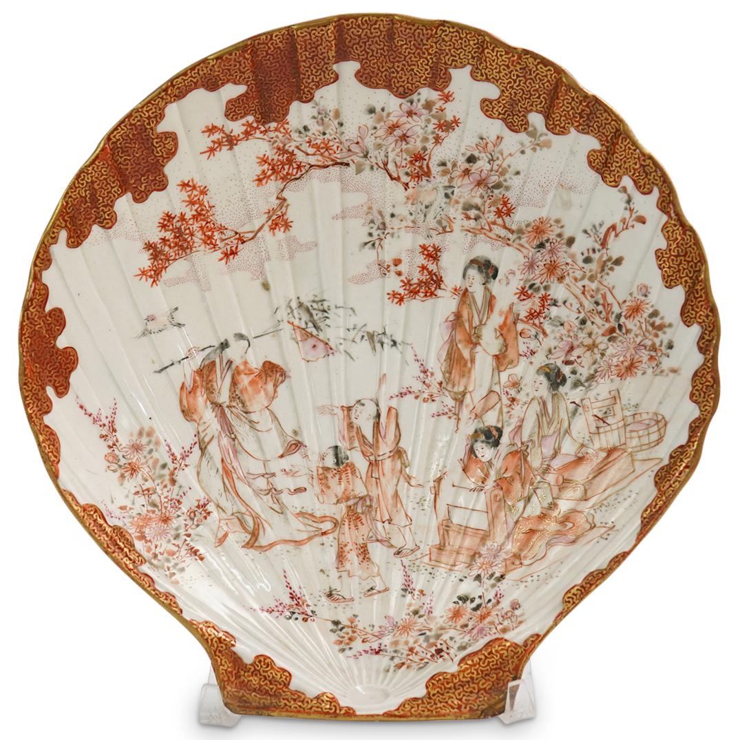 Japanese Kutani Porcelain Shell Dish: DESCRIPTION: An antique Japanese Kutani porcelain dish with shell form and hand painted figural motifs. Character marking underneath. CIRCA: 19th Cent. ORIGIN: Japan DIMENSIONS: H: 1.5" x D: 8.25" CON