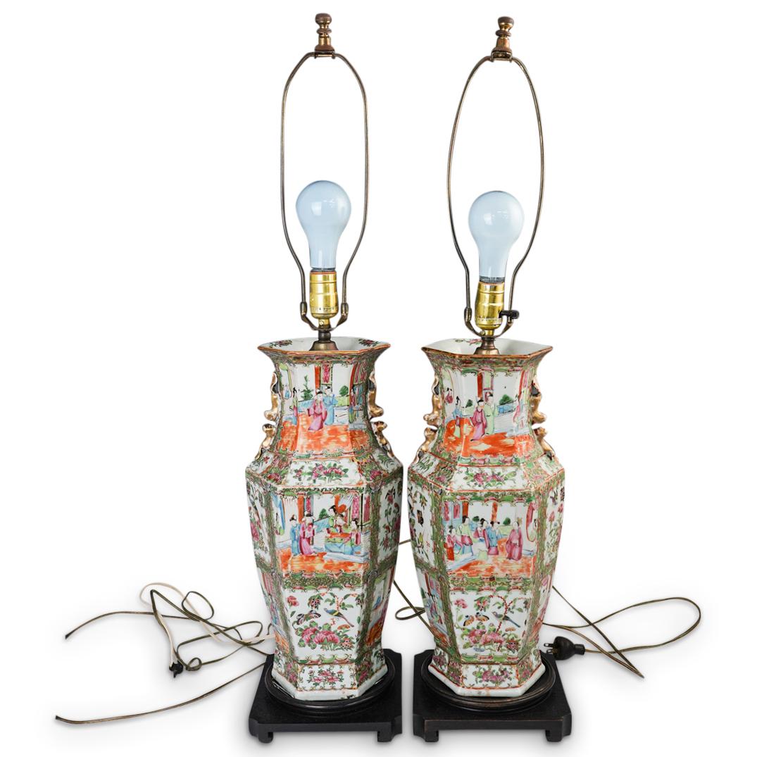 Pair Of Chinese Rose Medallion Vase Lamps: DESCRIPTION: A pair of antique Chinese Rose Medallion converted vase lamps. Features single bulb socket outlets, mounted to square wood bases. CIRCA: 20th Cent. ORIGIN: China DIMENSIONS: H: 34" x D: 7