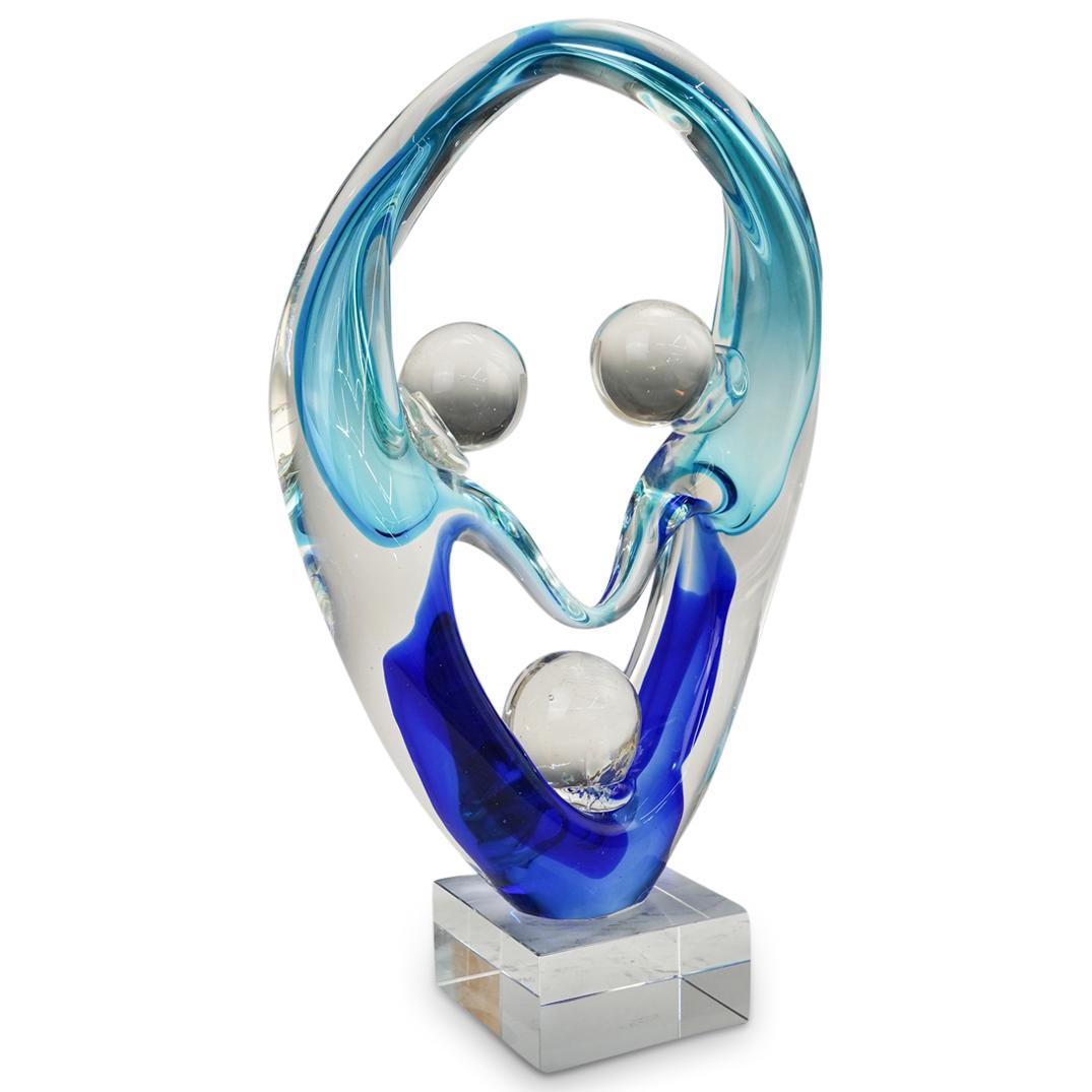 Murano "Together" Hand Blown Art Glass Sculpture: DESCRIPTION: Murano "Together" Hand Blown Art Glass Fused Sculpture depicting two entwined figures representing unity and fraternal love. Designed in oval shape clear glass with exquisite combination 