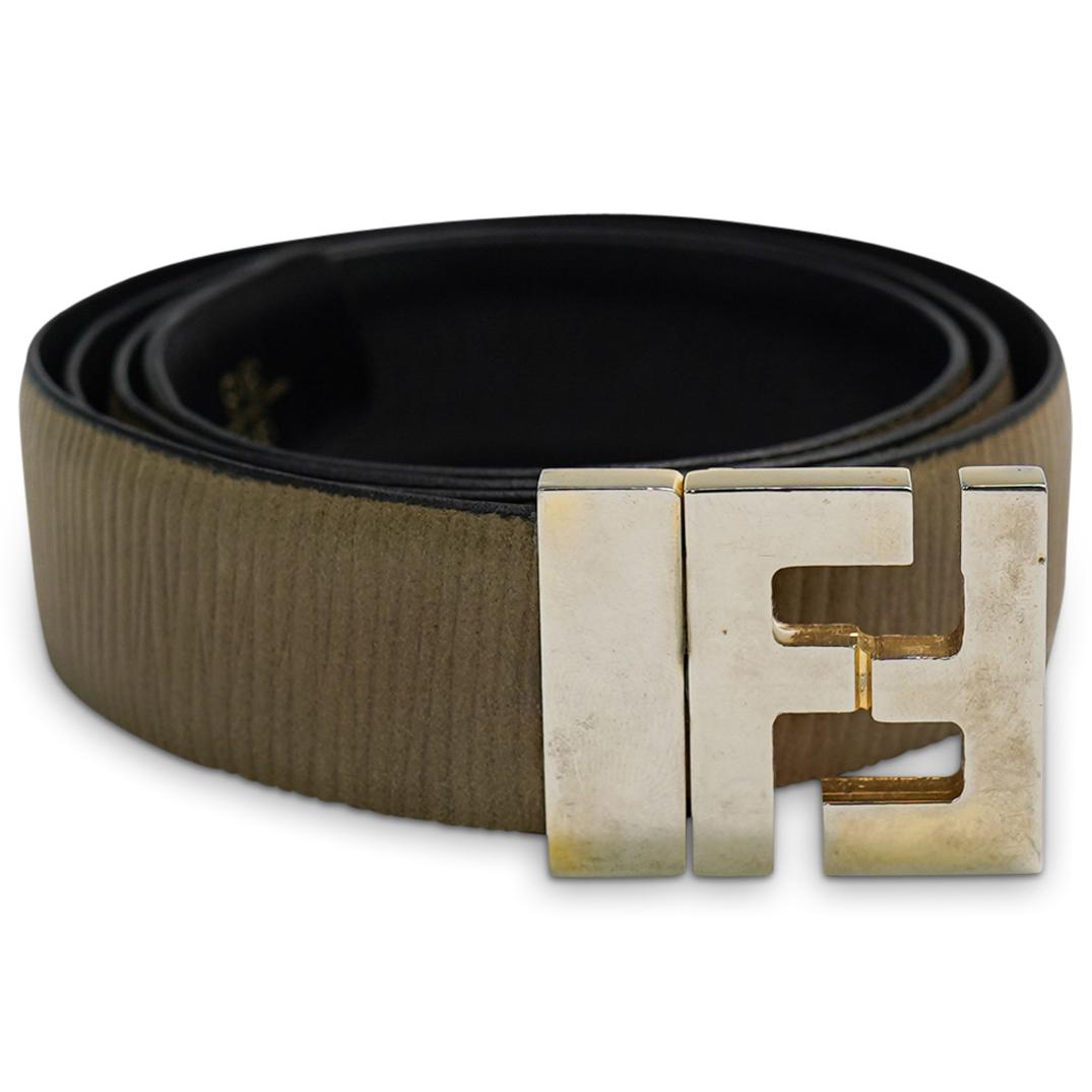 Fendi Women's Belt: DESCRIPTION: Fendi Women Belt in corrugated taupe leather with FF stud buckle. Gold-finish metalware. CIRCA: 21st Century. ORIGIN: Italy. DIMENSIONS: SIze 90. 36. Total length 38". CONDITION: Vintage 