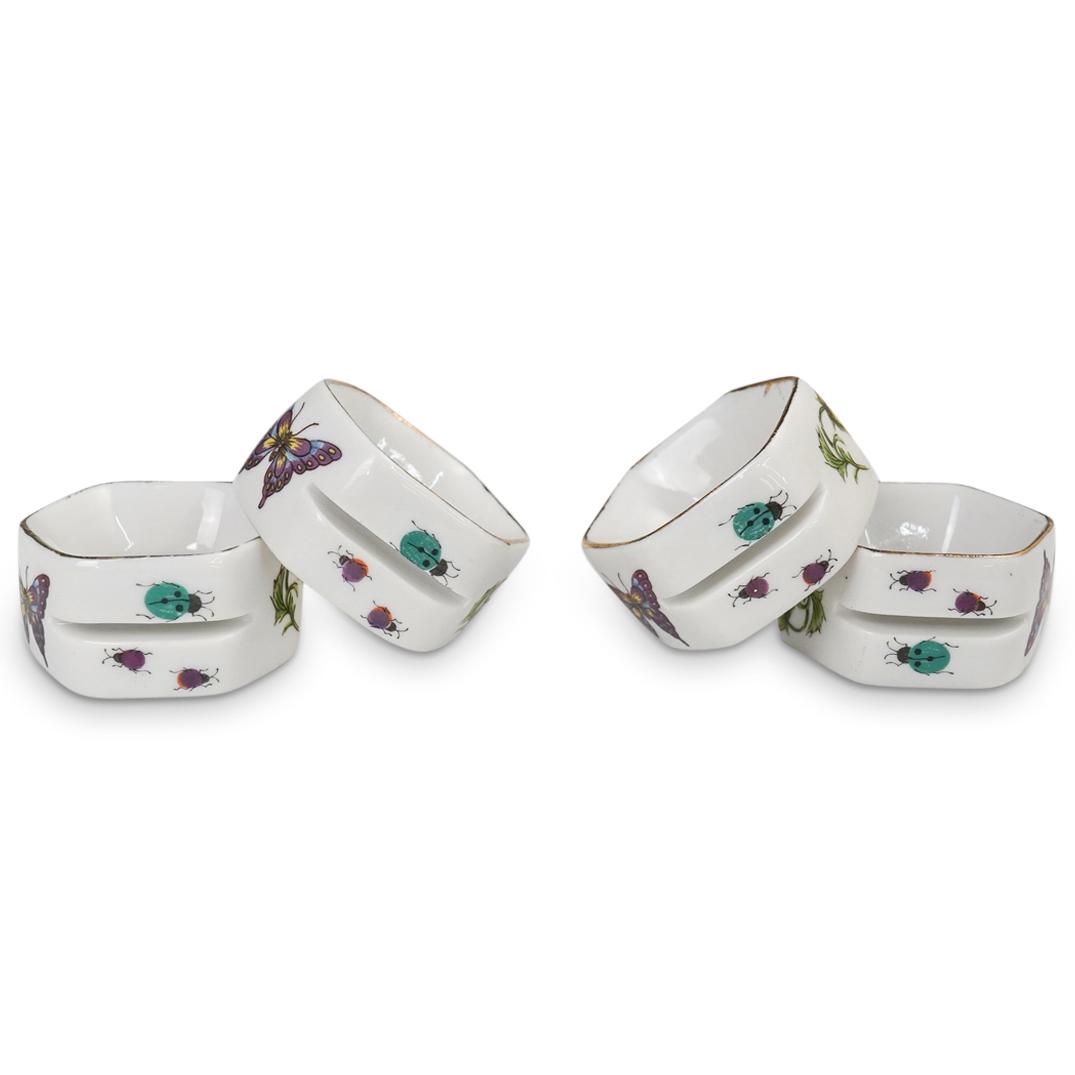(4Pc) Herend Style Porcelain Napkin Rings: DESCRIPTION: (4Pc) Herend style porcelain napkin rings with multi colored insect designs. CIRCA: 20th Cent. ORIGIN: Continental DIMENSIONS: W: 1" x D: 2" CONDITION: Great condition. See lot descriptio