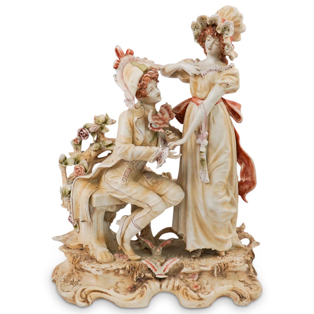 Capodimonte Porcelain Figural Group: DESCRIPTION: An antique Italian Capodimonte porcelain figural group. Features a bisque figural group depicting a courting scene with ornate details. Marked "AA, 6248" underneath. CIRCA: 19th Cent. ORI