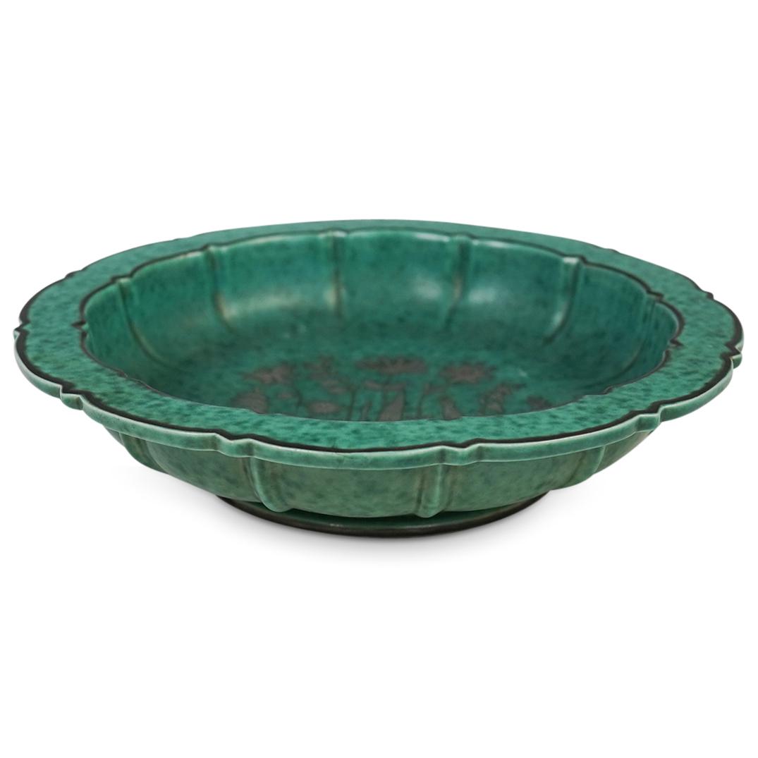 Gustavsberg Argenta Ceramic Bowl: DESCRIPTION: A Gustav Berg Argenta silver overlaid pottery bowl with floral decoration. Marked: "Gustav Berg Argenta, Made In Sweden" underneath. CIRCA: 20th Cent. ORIGIN: Sweden DIMENSIONS: H: 2.5" x