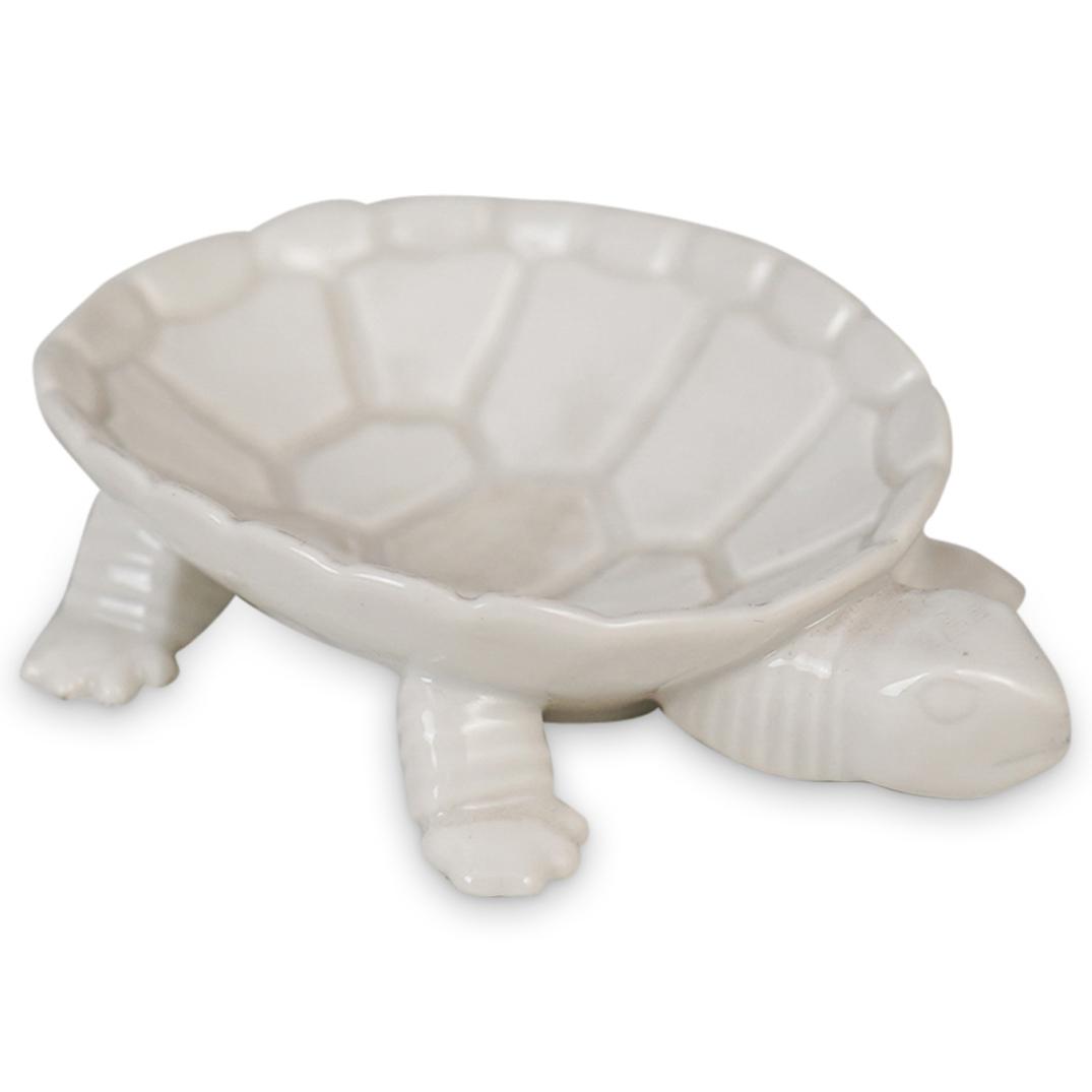 KPM Porcelain Turtle Dish: DESCRIPTION: A KPM porcelain turtle dish with white glossy glaze finish, marked with blue scepter underneath. CIRCA: 20th Cent. ORIGIN: Germany DIMENSIONS: H: 0.75" x D: 4" CONDITION: Great condition.