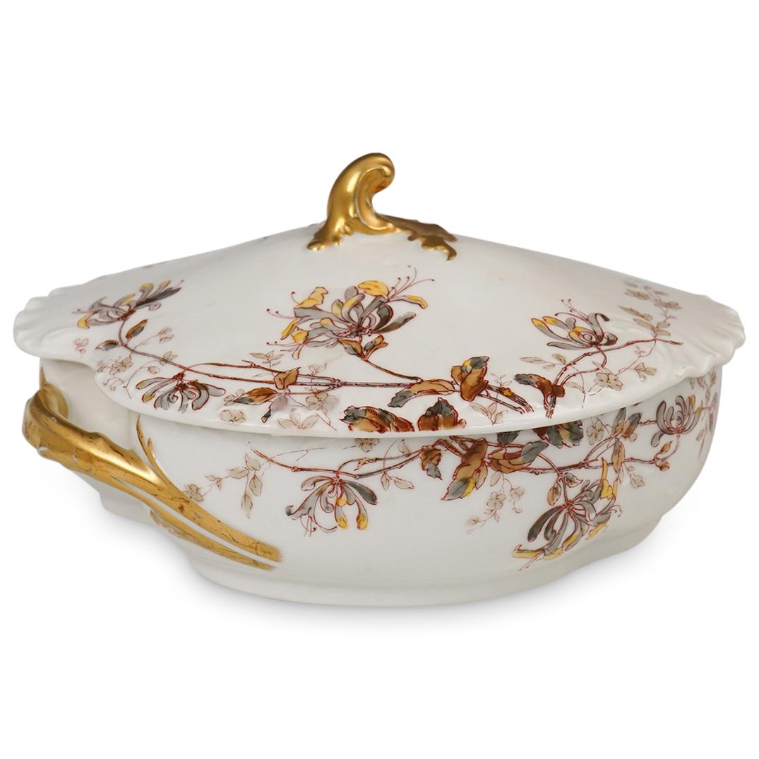 Haviland & Co. Limoges Tureen: DESCRIPTION: A Haviland Limoges porcelain tureen with multicolored floral painted designs. Finished with gilt accepted handles and finial. Marked: "Haviland & Co. Limoges, 308G" CIRCA: 20th Cent. ORIG