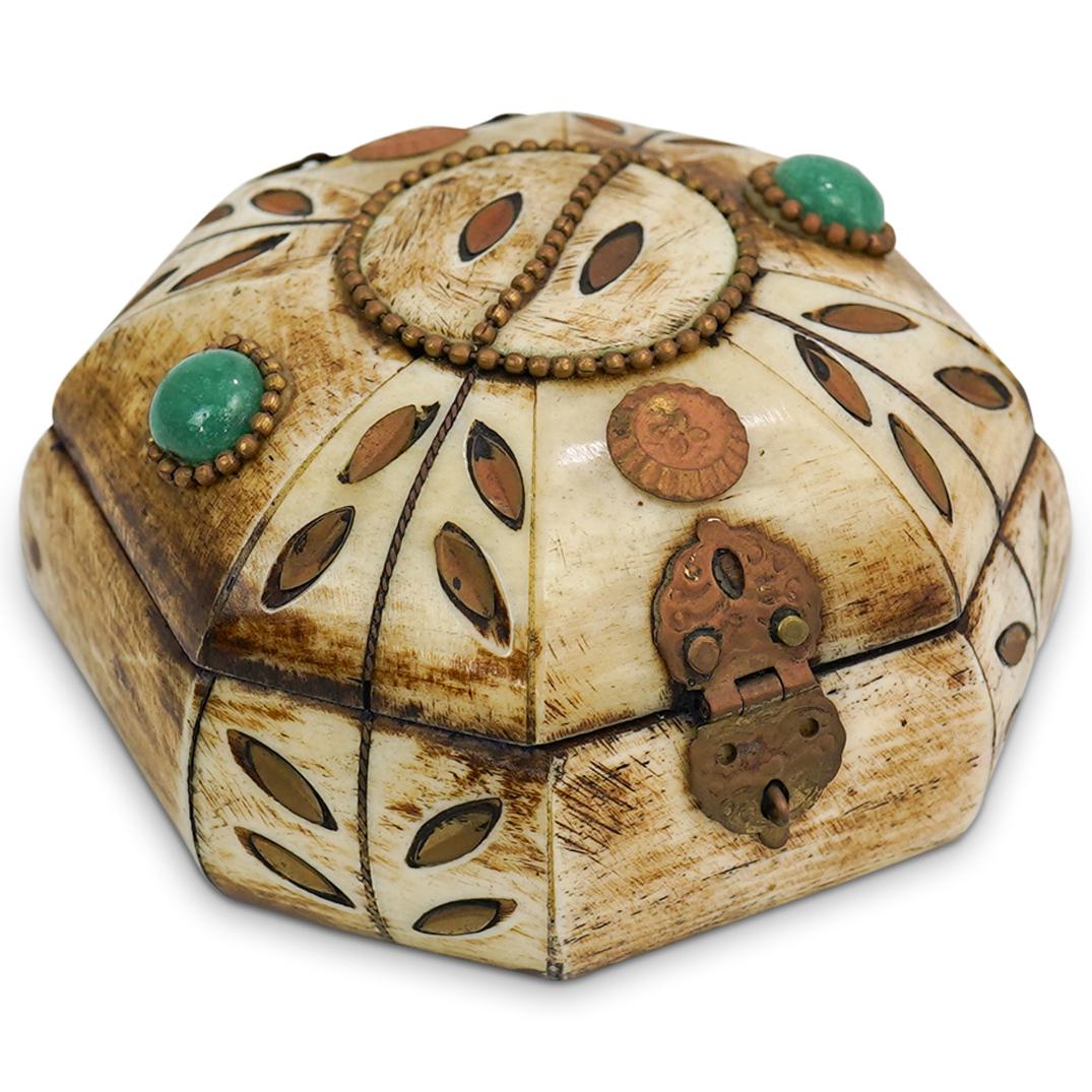 Semi-Precious Stone Bone Box: DESCRIPTION: An antique bone box with octagonal form and brass hardware hinged lid. Features semi-precious stone adornments and bronze beaded accents. CIRCA: 20th Cent. ORIGIN: Continental DIMENSIONS: