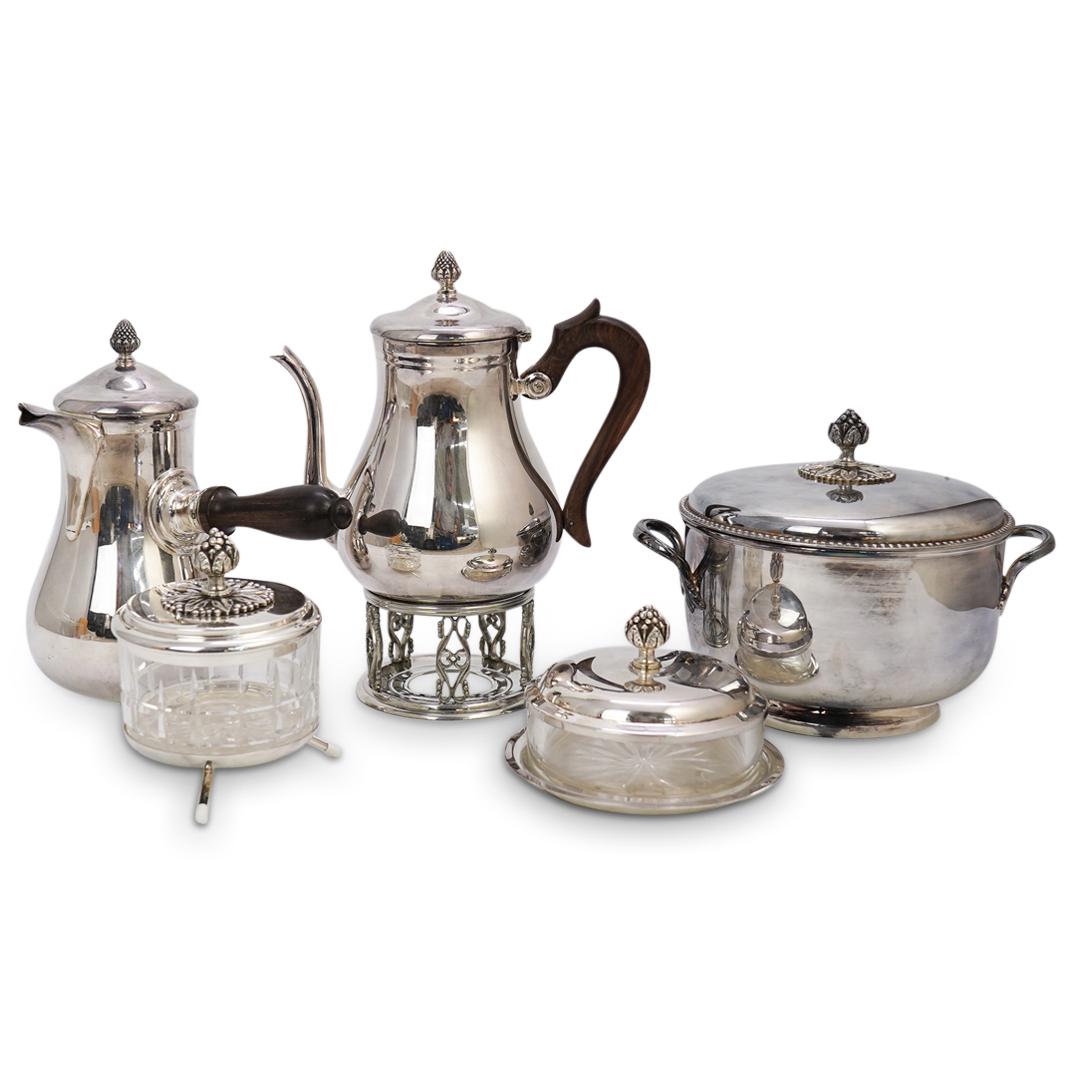 "Puiforcat RM" Silver Service Set: DESCRIPTION: A "Puiforcat, RM" silver service set. Hallmarked: "Puiforcat, RM" features: (1) Silver tea kettle with wood handle and acorn finial. (H: 8" x D: 8.5") (1) Silver wine kettle with wood han