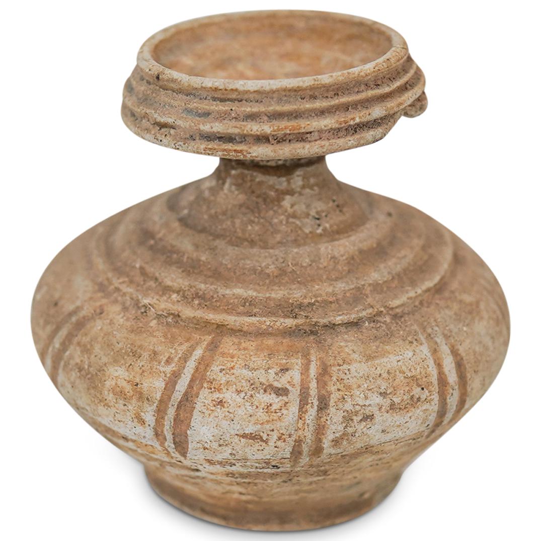 Ancient Khmer Pottery Miniature Baluster Bottle: DESCRIPTION: Ancient Khmer Pottery Miniature Baluster Bottle. (Ref. C05). CIRCA: 16th Century, possibly older. ORIGIN: Asia. PROVENANCE: From the Estate of Peggy Slappey a known collector with exhibit