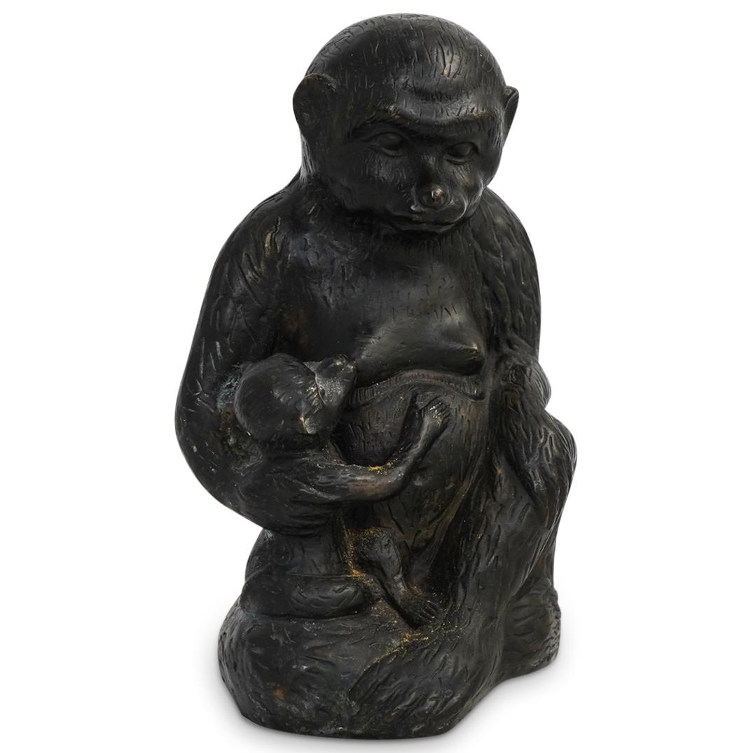 Chinese Monkey With Baby Bronze: DESCRIPTION: A Chinese bronze featuring a monkey embracing a smaller monkey. Cast with intricate fur and facial details. CIRCA: 20th Cent. ORIGIN: China DIMENSIONS: H: 8.5" x D: 5" CONDITION: Great co