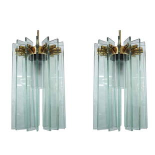 Pair of Fontana Arte Glass and Brass Chandeliers: DESCRIPTION: Pair of Mid Century Fontana Arte Brass Chandelier with Clear Glass Panels. This mid century modern ceiling lamp has lights and consists of a central metal structure with 16 removable