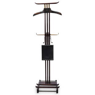 Dupre Lafon For Hermes Night Valet Coat Rack: DESCRIPTION: A wood "Night valet" with coat rack and removable shelf entirely covered in black leather, held in varnished wood uprights and ending with tubular brass cross pieces forming shoe racks.