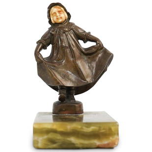 Austrian Bronze Girl Sculpture: DESCRIPTION: An Austrian bronze figural statue featuring the depiction of a young girl lifting her dress. Designed with an inlaid bone carved face and mounted to a rectangular onyx base. Stamped: