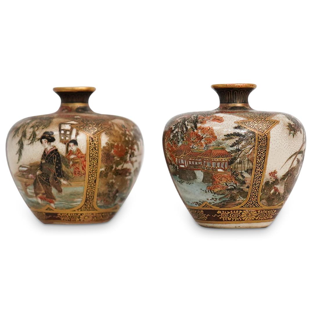 Pair Of Meiji Satsuma Vases: DESCRIPTION: A Pair of Antique Satsuma porcelain vases feature in a bulbous body with a short tapered neck, each vase in uniquely painted with palace scenes, birds in nature settings and Regal woman. 
