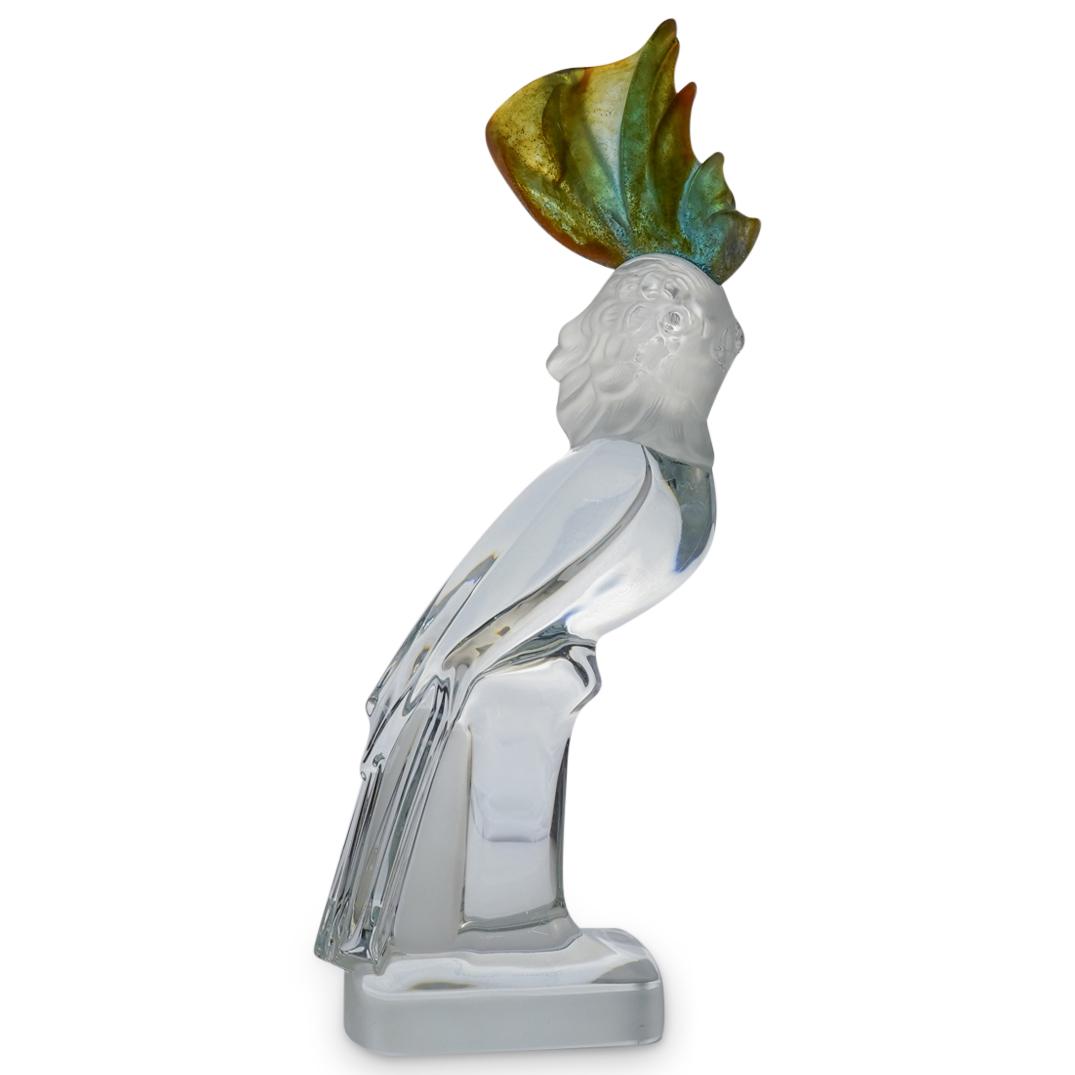 Daum Crystal Cockatoo Sculpture: DESCRIPTION: Daum France Frosted and Clear Cockatoo with a Colored Crest, incised along the base "Daum France" CIRCA: 20th Cent. ORIGIN: France DIMENSIONS: H: 14" CONDITION: Small chip shaved down on