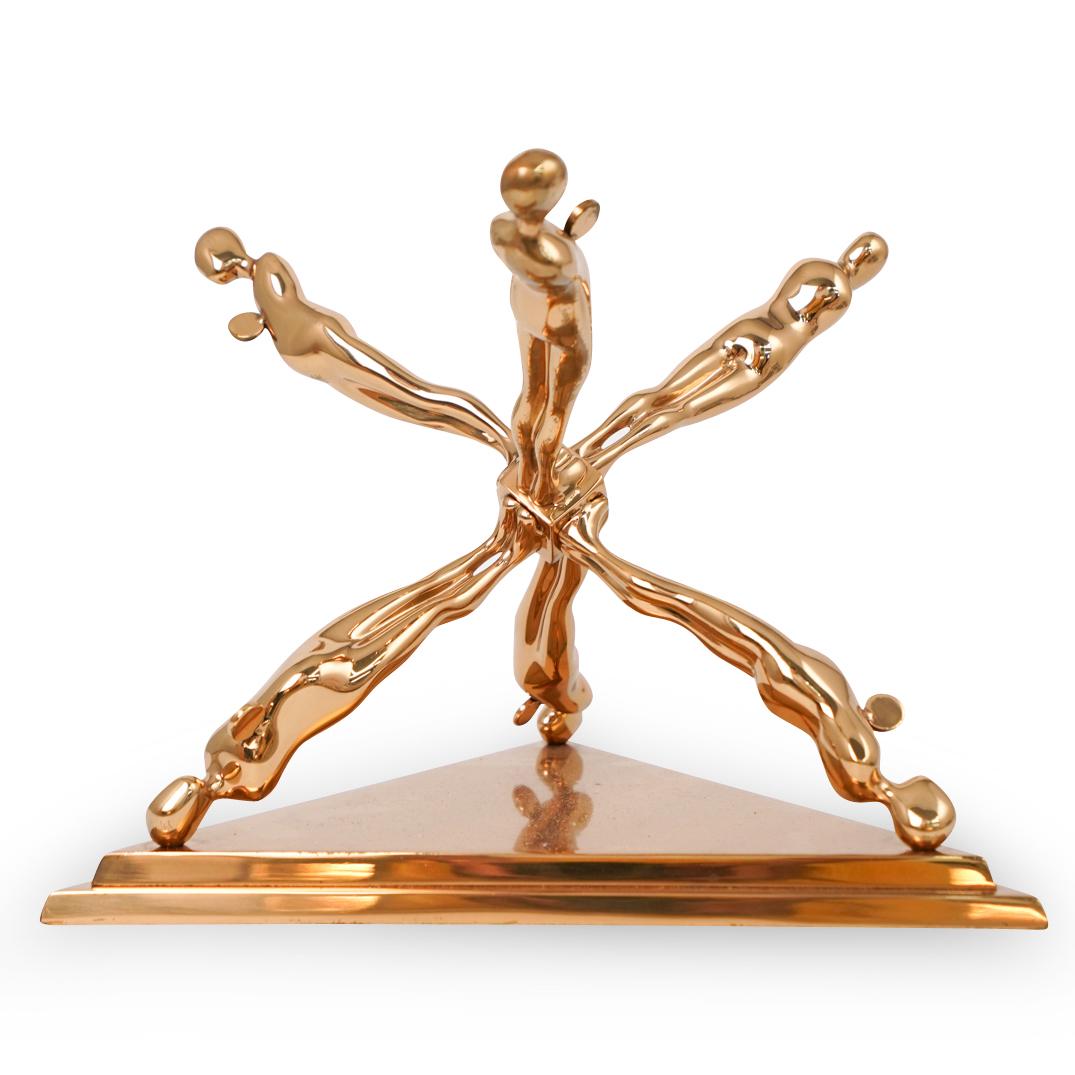 Ernest Trova (American.1927-2009) Standing Jackman: DESCRIPTION: A sculpture by surrealist artist Ernest Trova, composed of polished bronze titled "Standing Jackman" Features multiples figures mirroring each other. Stamped along the underside "8/99 198