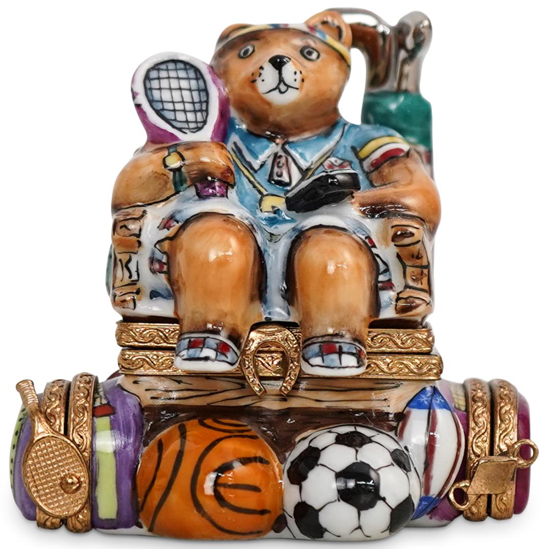 Limoges La Gloriette Sport Bear Trinket Box: DESCRIPTION: 3-Hinged Multi Sport Bear La Gloriette Limoges Trinket Box. Depicts a sitting female bear dressed as tennis player. Marked on interior " Sportif". Marked on the exterior: "Limoges France 