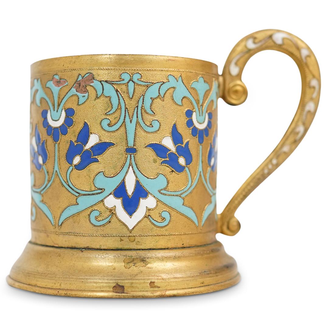 Vintage Enamel and Brass Tea Glass Holder: DESCRIPTION: A Signed Soviet Period Brass tea glass holder with enamel decorative floral motif. CIRCA: 1960s. ORIGIN: Rusia. DIMENSIONS: H: 3 3/4" W: 3 3/8". CONDITION: Vintage condition. See lot desc