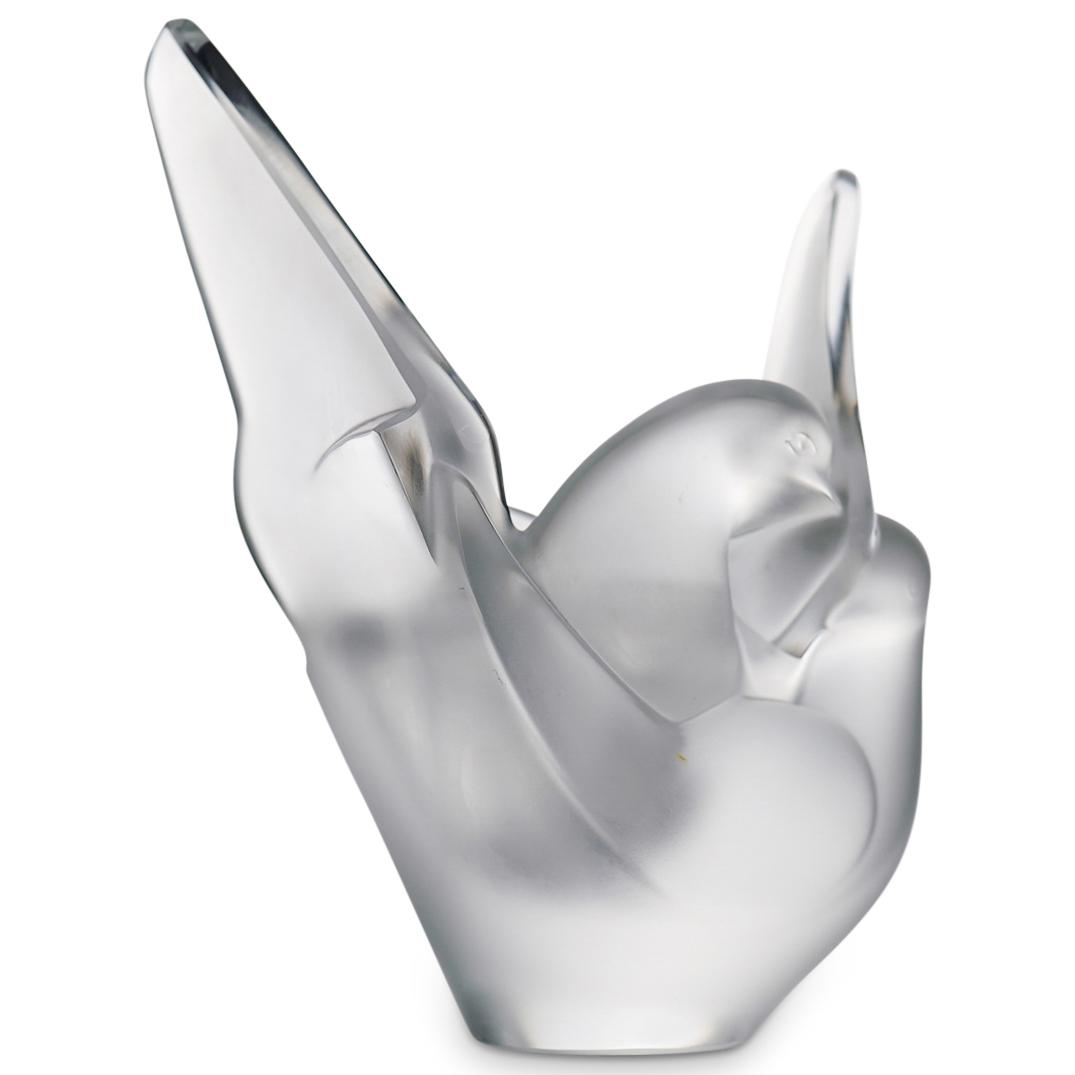 Lalique Crystal "Sylvie" Vase: DESCRIPTION: A Vintage Lalique "Sylvie" Crystal Vase. This frosted crystal vase features two romantic doves birds and includes a frog holder to easily display flowers. This model has been created in 1