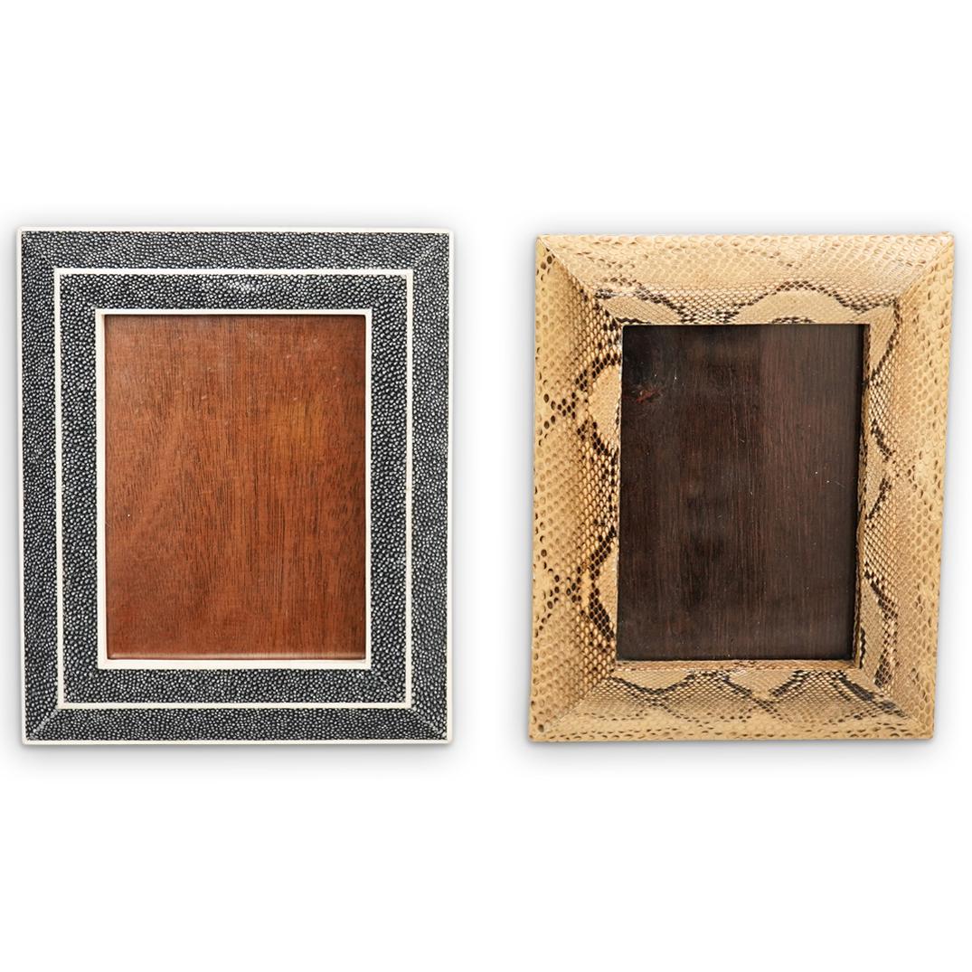 (2 Pc) Garrison Rousseau Exotic Frames: DESCRIPTION: a lot of Two Garrison Rousseau frames feature the following: (1) Squared frame composed of yellow snake skin, fitted with Rousseau plaque along the back. (1) Squared frame composed of sti