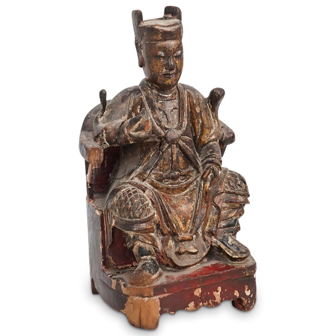 Chinese Antique Carved Wood Figure: DESCRIPTION: An Antique Chinese Emperor Carved Wood Figure. This finely carved sculpture depicts an Emperor in a seated position dressed in an elaborated costume. This is an antique sculpture hand car