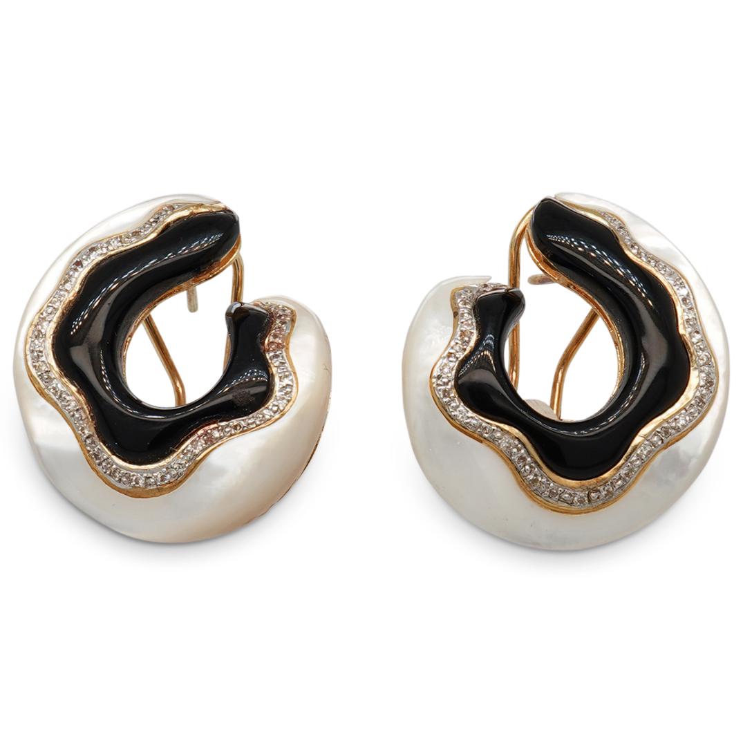 14K Diamond Onyx & Mother Pearl Earrings: DESCRIPTION: A pair of 14 karat yellow gold ladies earrings featuring a wavy pattern of mother of pearl and black onyx separated by approx 0.25 carats of diamonds. Marked on the back 14K and 585. Tota
