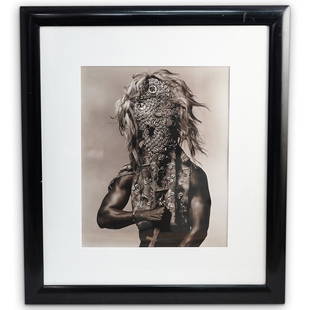 Len Prince (American, B. 1953) " Perry with Hunter's: DESCRIPTION: Len Prince (American, B. 1953) " Perry with Hunter's Mask" Photograph. Depicting a black/white rendition of a male figure, wearing an African mask. Pencil signed on the back " 1/10, 1990"