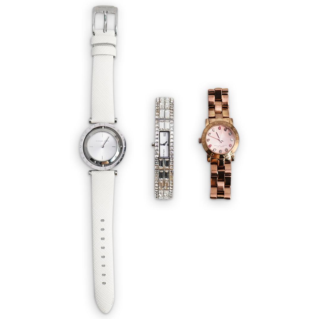 (3Pc) Designer Watch Grouping: DESCRIPTION: (3Pc) A grouping of designer watches. Includes: (1) Marc by Mark Jacobs gold toned watch. (H: 1" x L: 4") Open Clasp (1) DKNY stainless steel watch with crystal set accents. (H: 4.5" x L: