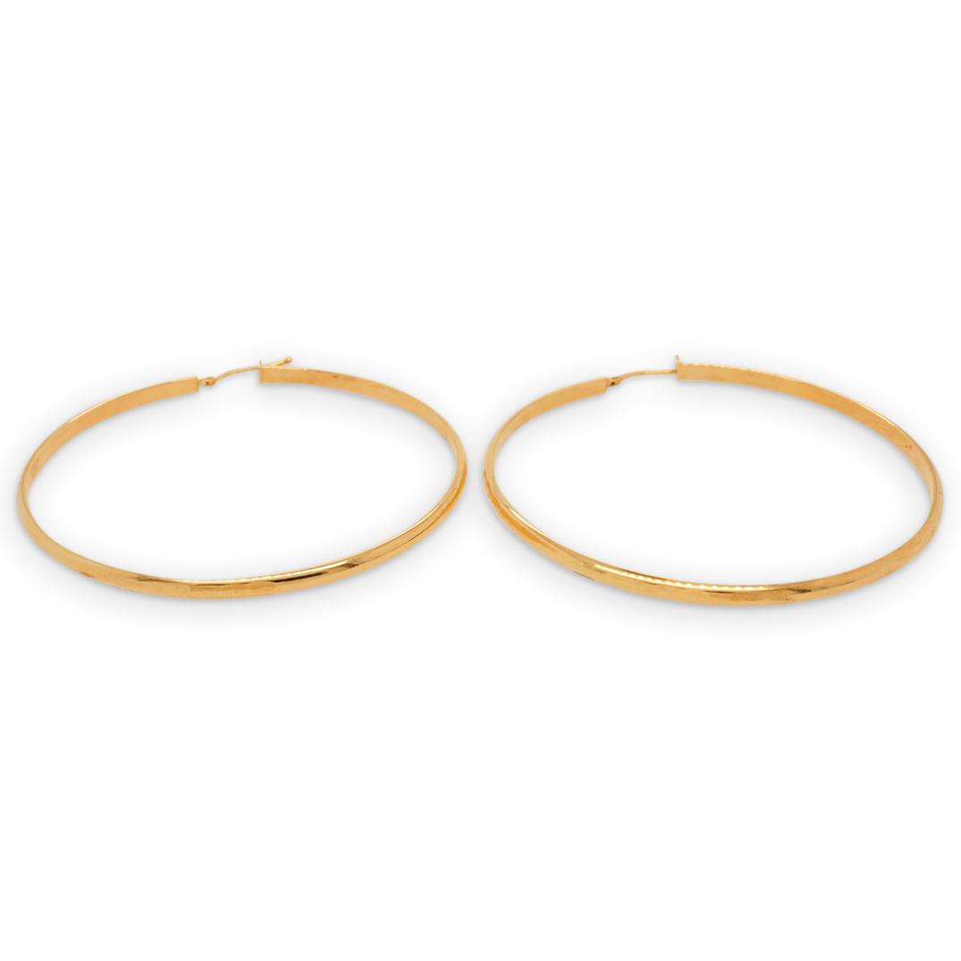 Italian 14k Gold Hoop Earrings: DESCRIPTION: A pair of Italian 14k yellow gold hoop earrings, stamped along the closure "14k Italy". Total Weight: 4.5 Grams CIRCA: 20th Cent. ORIGIN: Italy DIMENSIONS: Diameter: 2.25" Have a similar 